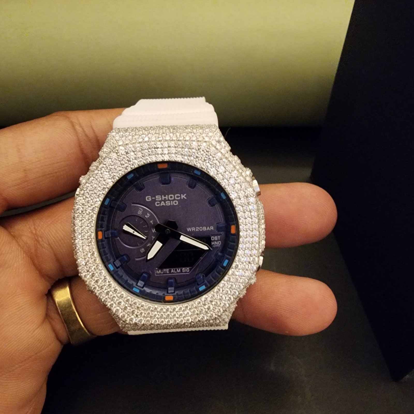 Men's Half Iced Out Black Dial White Rubber Band Pave Diamond Case Alternate View