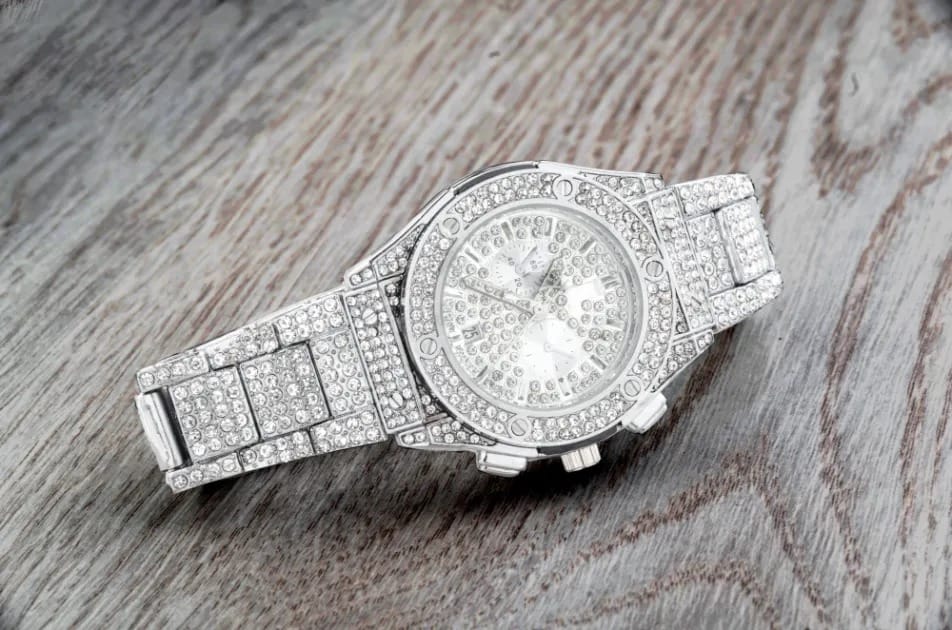 Luxury Watches in Silver with Full Diamond Embellishment on Wooden Background