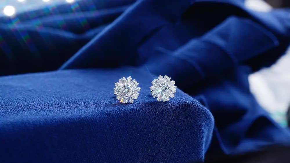 Elegant Diamond Earrings featuring a cascading drop design with brilliant-cut stones, perfect for evening wear.