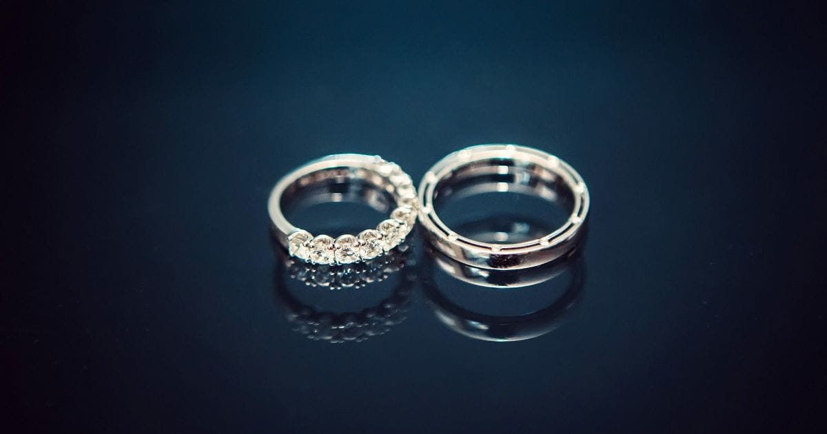 Elegant halo engagement rings in white gold setting with sparkling center diamond
