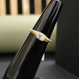Trendy Unique Oval Cut Yellow Band Engagement Ring